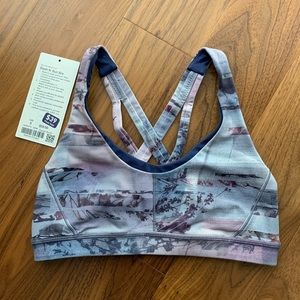 Stash N’ Run Bra in Sunset Multi sports bra
